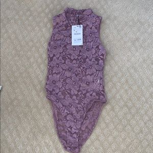 Sleeveless lace purple bodysuit